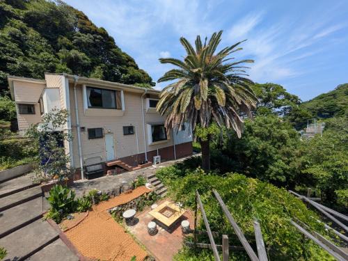 Kakisaki Villa | 涛Tõ-外浦海水浴場徒歩4分-囲炉裏BBQ-プライベートサウナ-最大10名-大人のリゾートハウス