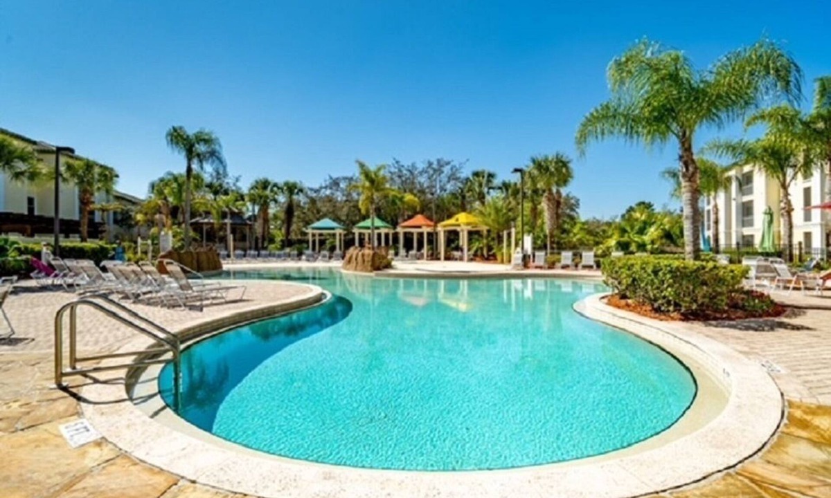 West Kissimmee Condo | 19-104 Two Master Suites, gated resort with heated pool, playground, lakes. gym