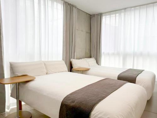 Higashinippori Apartment | 301Room,7-minute walk from Uguisudani Station located on the 3nd floor of an apartment-style building Twin room No elevator