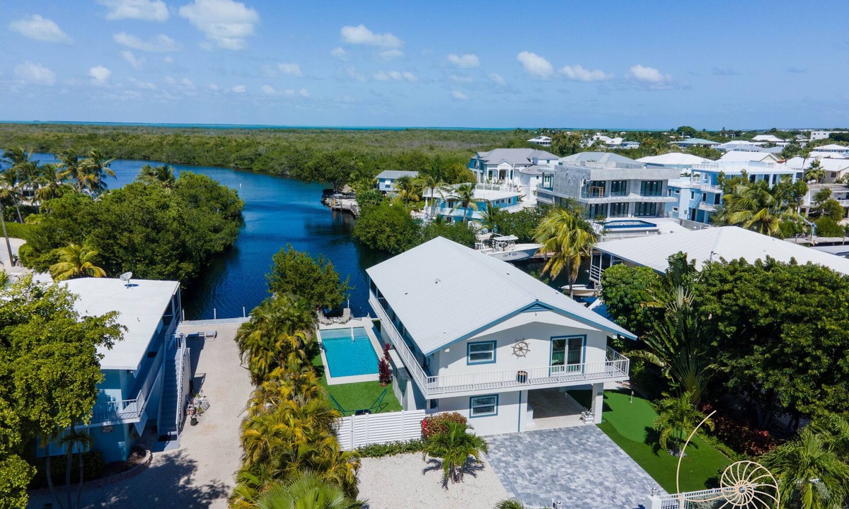 Sunshine Estates House | 5 Bedroom/4 Bath Relaxed Plantation Key Resort Style Home with Pool & Dockage