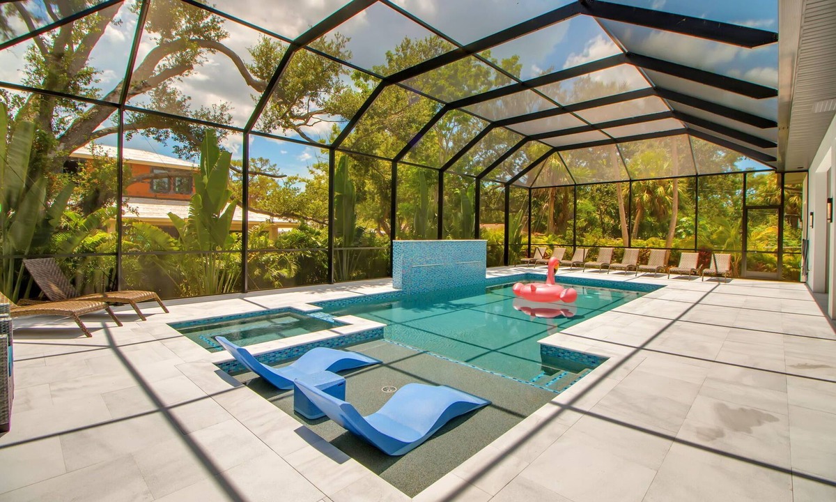 Arlington Park House | Arlington Oasis - Luxury 5 Bed Home, Heated Pool, E-bikes by Gulf Coast Holiday Homes