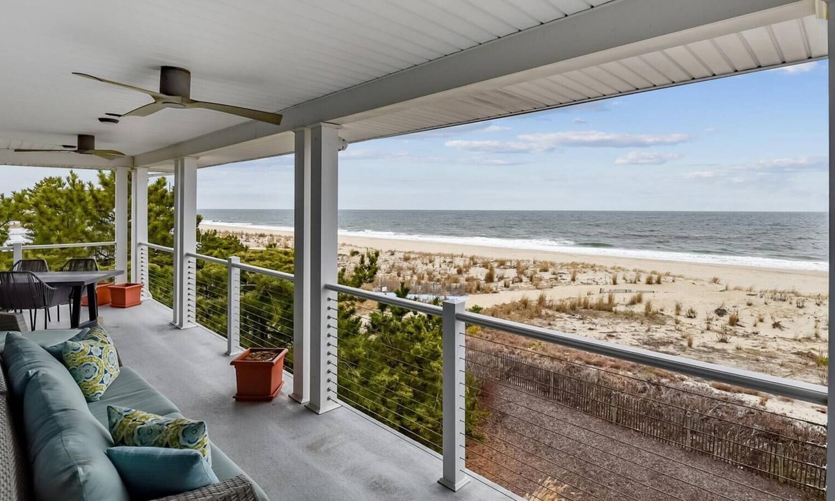 Rehoboth by the Sea Condo | Beautiful Oceanfront Condo with large wrap around deck!