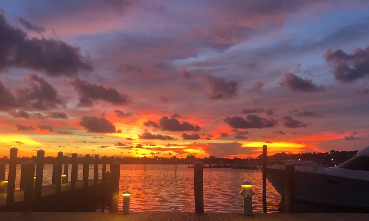 Upper Grand Lagoon Villa | Beautiful sunset waterfront 1st floor marina villa. Quiet safe gated community.