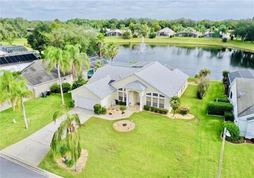 Sunridge Woods House | Beautiful Waterfront Home with Heated Pool and Game Room