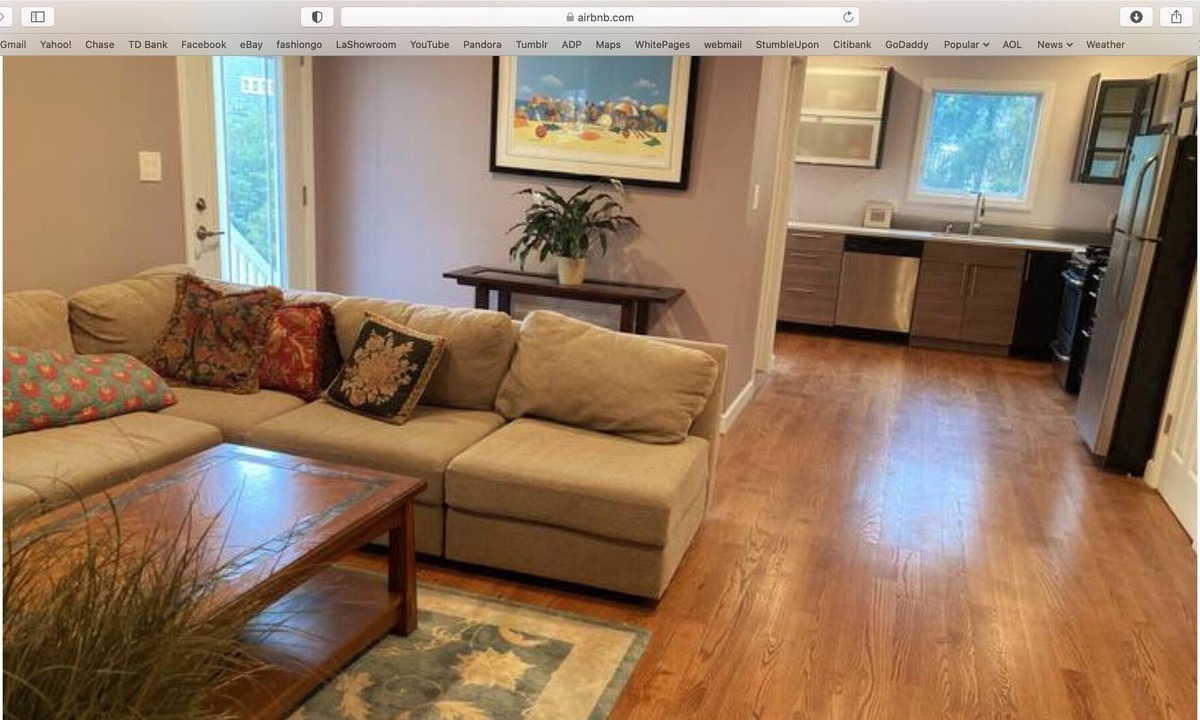 Lido Beach House | Charming canal-front apartment with dock & kayak, walk to restaurants and beach