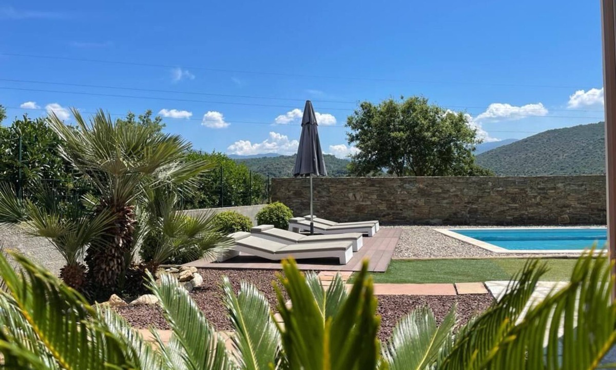 Oletta House | Contemporary villa with swimming pool and private garden