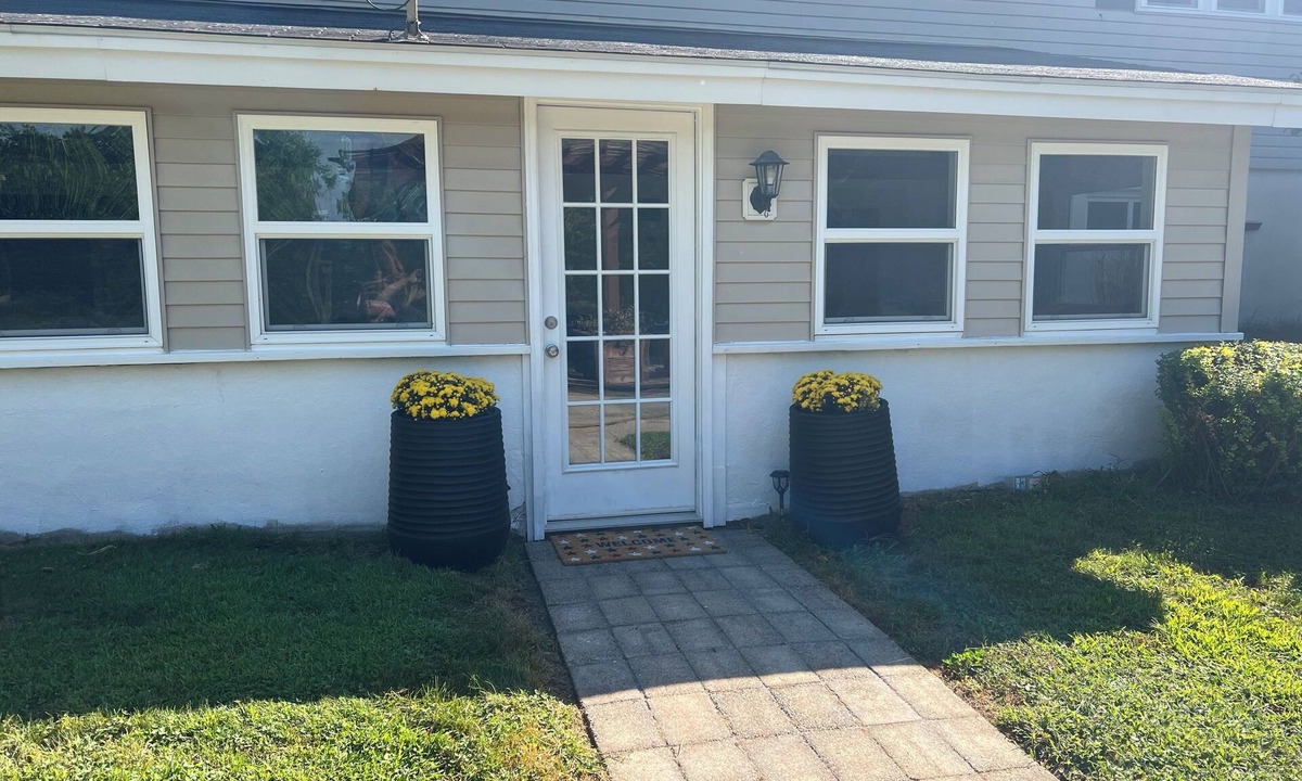 Phoenix House | Cozy Oswego River Area Basement Suite Sunroom & Hot Tub in Phoenix NY