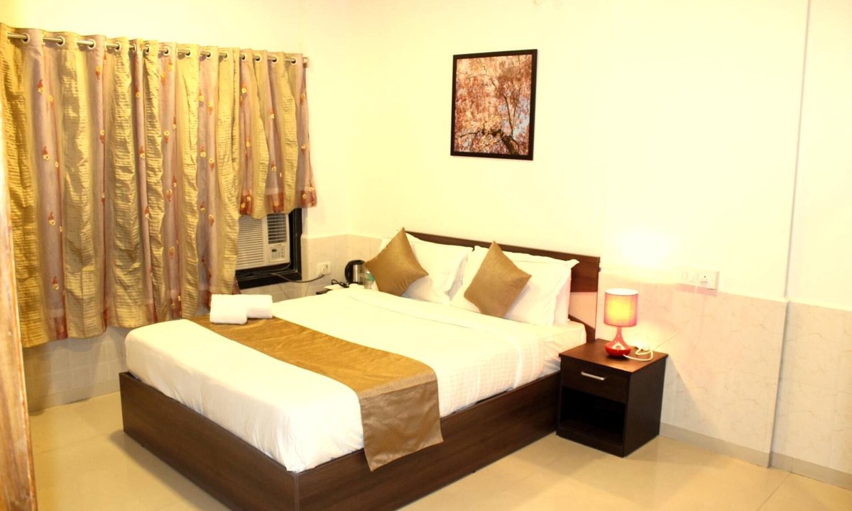 J B Nagar Hotel | Dragonfly Apartments Emerald