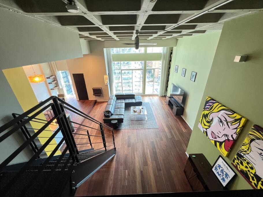 Church and Wellesley Apartment | Huge 2 Storey Loft W designer furniture and art