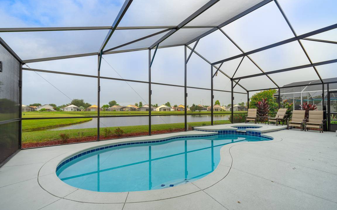 Crescent Lakes House | Lake Views, Relaxing Pool/Spa. Updated Home. PET FRIENDLY