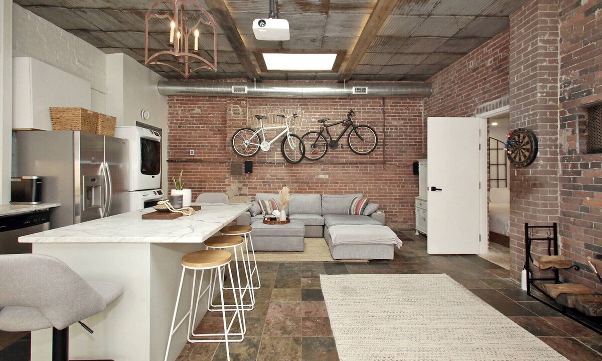 Leslieville Apartment | Leslieville LOFT with Wood Burning Fireplace and Skylights! Parking Included.