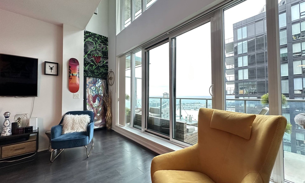 King West Village Condo | Liberty Village charm, vibrant community, and a spacious loft await your stay!