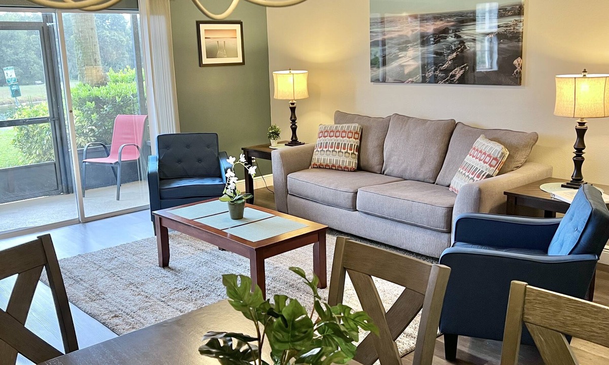 West Kissimmee Condo | Oakwater Resort, Two Miles to Disney, Lake View, Relax in our Hot Tub and Pool!