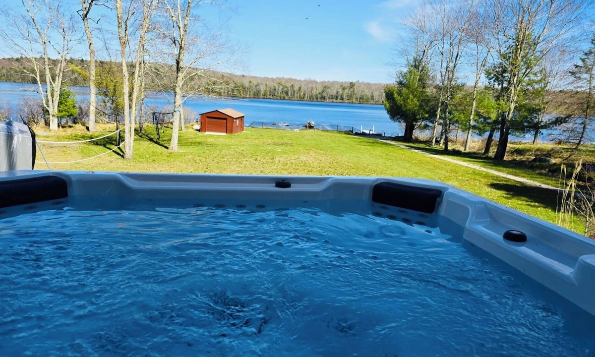Monticello Ski Chalet | Serenity at Lake Joseph | Lakefront Hot Tub Ski
