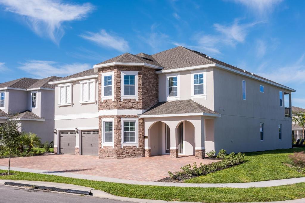 West Kissimmee Villa | Spacious Home by Rentyl Near Disney with Private Pool, Movie Room, Air Hockey Table & Resort Amenities - 530B