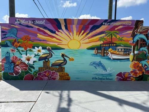 Holiday Hotel | Sunshine Inn Motel