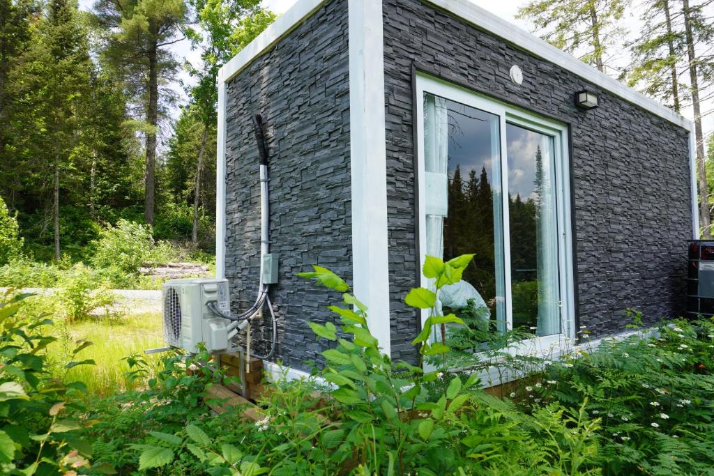 Strong House | Tiny House By The River