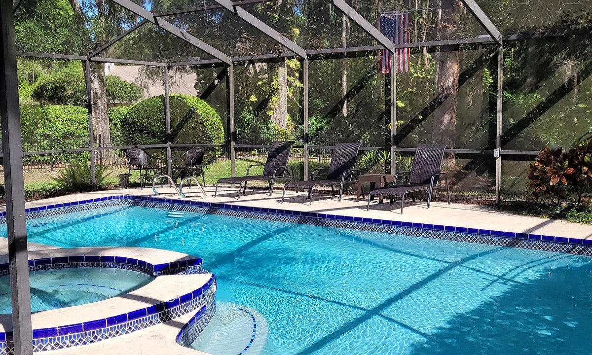 Temple Terrace House | Tropical Oasis with Lanai, Pool and Dock. Sleeps 12 guests