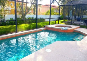 4 bedroom single story house with south facing pool and spa close to Disney