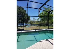 Cozy lake house with private heated pool near Disney