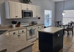 Fantastic pool home with south facing pool, in a gated community