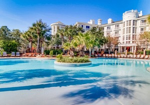 Renovated studio with pool, hot tub, full sized fridge, and 2 burner stovetop
