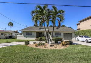 This lovely vacation home with its lush and beautifully manicured landscaping is located on the mainland of Fort Myers Beach, at 18116 Cutlass Drive.