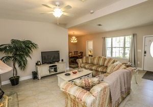 This lovely vacation home with its lush and beautifully manicured landscaping is located on the mainland of Fort Myers Beach, at 18116 Cutlass Drive.