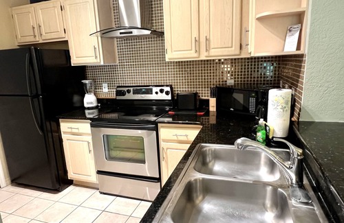 West Kissimmee Condo | 19-104 Two Master Suites, gated resort with heated pool, playground, lakes. gym