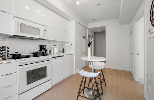 CityPlace Condo | 1BR 1 Bath 3 Guests Parking Balcony Near CN Tower Downtown—By Hostia