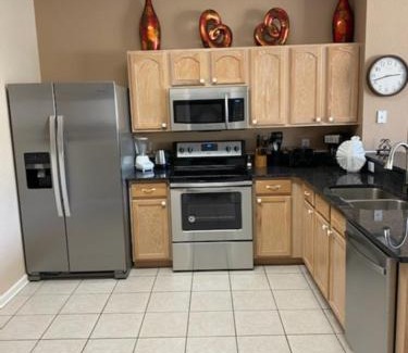 Windsor Hills House | 3 BR 2 Miles to Disney, pool, free WiFi and more townhouse