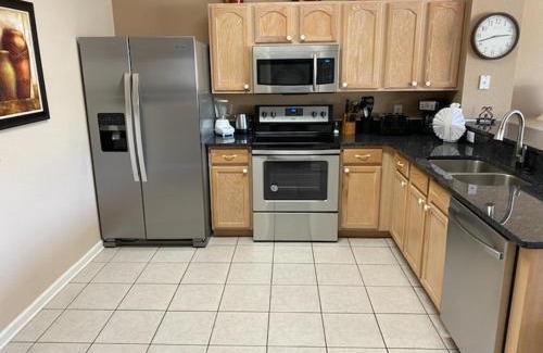 Windsor Hills House | 3 BR 2 Miles to Disney, pool, free WiFi and more townhouse
