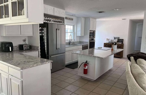 Melbourne Beach House | 4/3 Home on A1A with private beach access WiFi, fitness room & heated pool