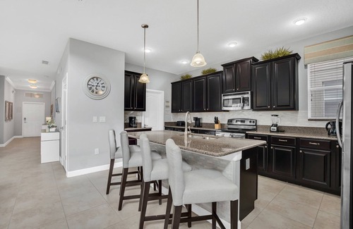 Bay Lake House | 9008 Paradise Palms Blissful Haven: 5-Bed Oasis of Luxury and Tranquility