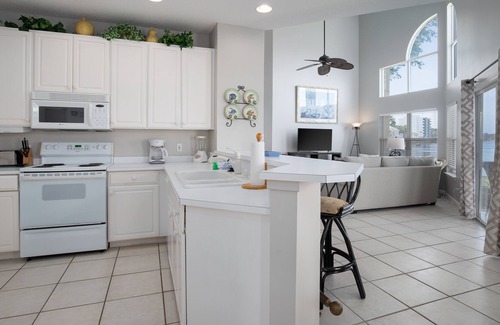 Miramar Beach Condo | Amazing Marina and Bayfront Views! Coastal Decor, Walk to Pool, Tram to BEACH