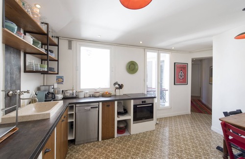 Saint-Vincent-de-Paul Apartment | Balcony Over The Tree-Lined Boulevard, by Veeve