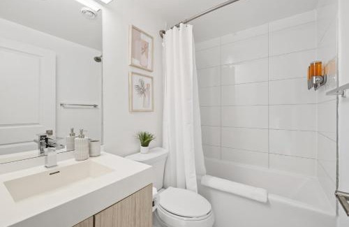 Garden District Apartment | Bright 2BR Condo w Patio Central Toronto Retreat