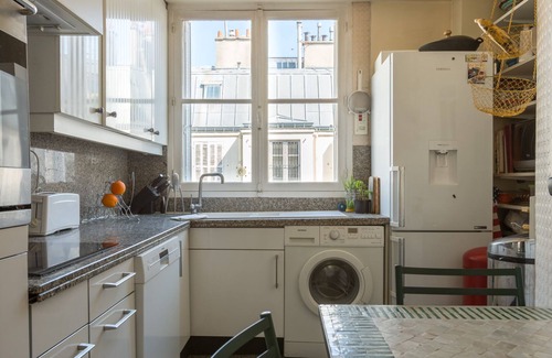 Saint-Vincent-de-Paul Apartment | Character in Barbes Rochechouart, by Veeve