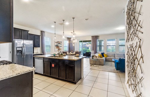 Sunridge Woods Villa | EV 7049 - 6 Bed 4.5 Bath Villa with Screened-In Private Pool with Spillover Spa,