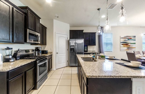 Sunridge Woods Villa | EV 7049 - 6 Bed 4.5 Bath Villa with Screened-In Private Pool with Spillover Spa,
