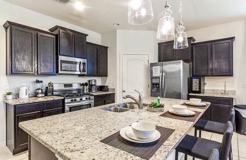 Sunridge Woods Villa | EV 7049 - 6 Bed 4.5 Bath Villa with Screened-In Private Pool with Spillover Spa,