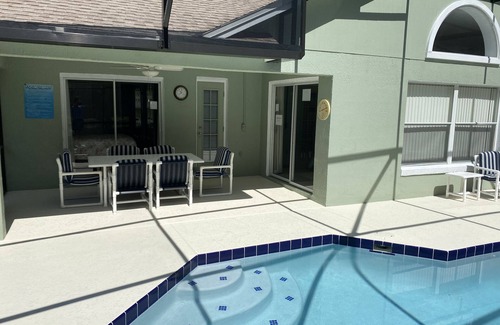 Kissimmee House | GORGEOUS POOL HOME IN QUIET TRANQUIL SETTING CLOSE TO ATTRACTIONS & OUTLETS