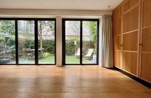 15th Arrondissement Apartment | "La Belle Époque: A Glamorous 1930s Art Deco Mansion with garden &Summer Lounge"
