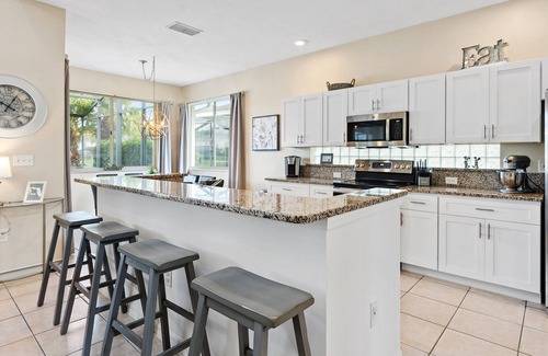 Sunset Lakes Villa | NEW Stunning Lakeview/Gated/Just a few miles to Disney