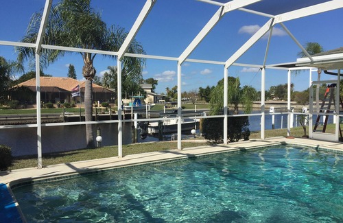 Punta Gorda House | Peaceful, canal home in desirable Punta Gorda Isles. Walk to Fishermen's Village