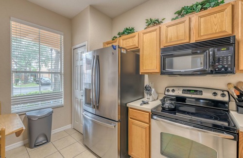 Kissimmee House | Popular 4 Bed Resort home, w/resort pool, & water slides. Disney 4 miles
