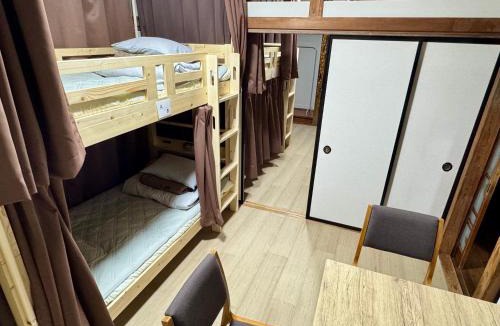 Yabuzuka Onsen House | 木の家ゲストハウス太田南口館