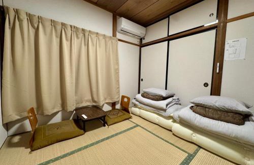 Yabuzuka Onsen House | 木の家ゲストハウス太田南口館