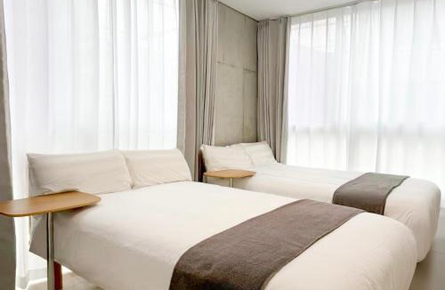 Higashinippori Apartment | 101Room,7-minute walk from Uguisudani Station located on the 1nd floor of an apartment-style building Twin room No elevator