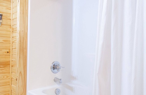 Ramer RV Rental | 1bd rm, 1 bth, hotel style cabin w/Mini fridge, micro, & tv, at Kick Back Ranch